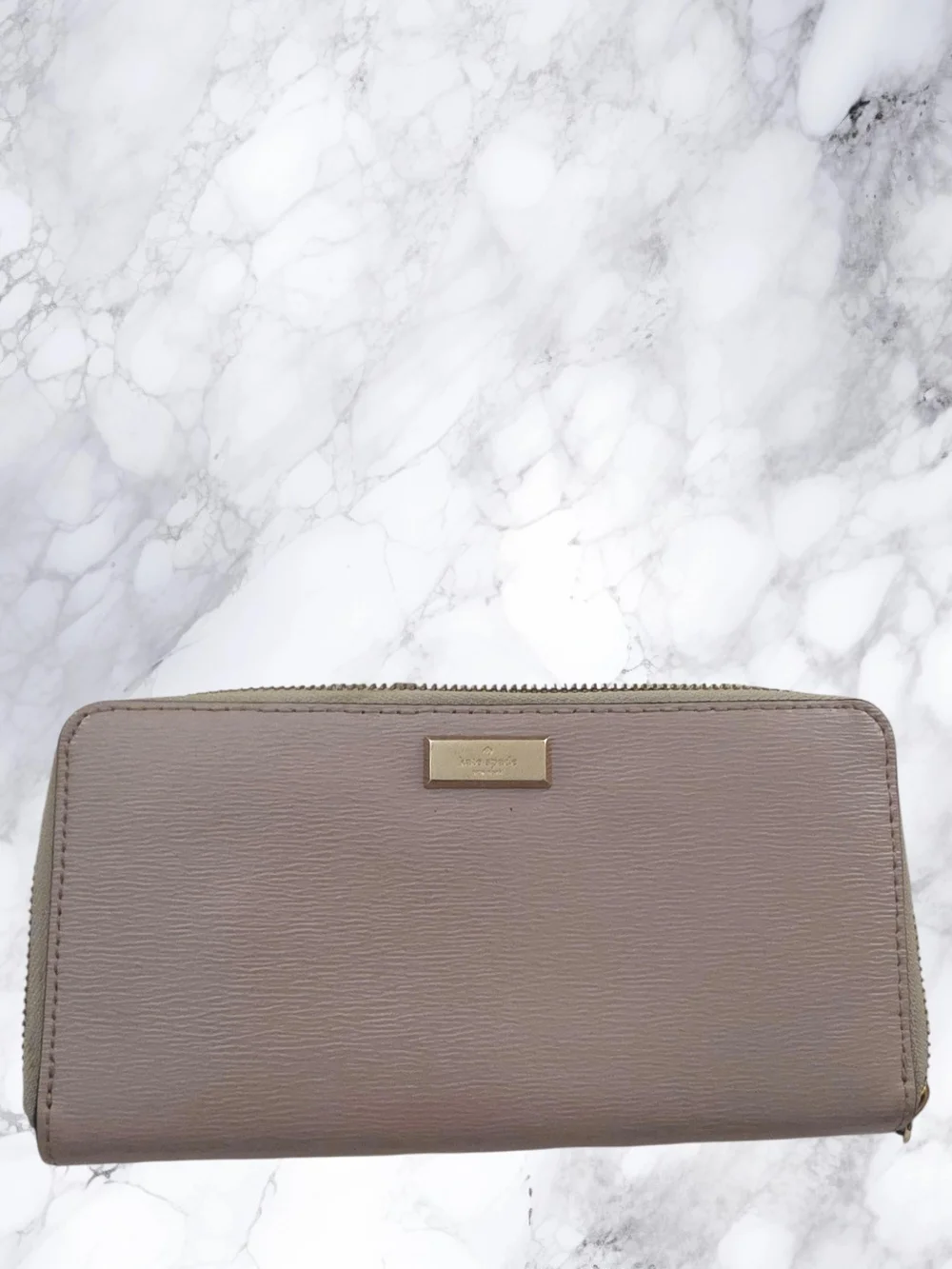 kate spade Rose Gold Zip-around wallet with gold plaque